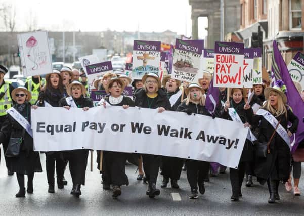 Glasgow City Council workers dress as suffragettes to march for equal pay. Picture: Robert Perry