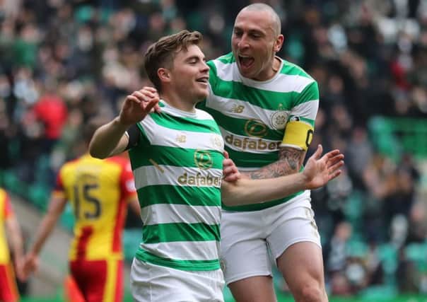 Jame Forrest celebrates after putting Celtic ahead. Picture: PA/Andrew Milligan