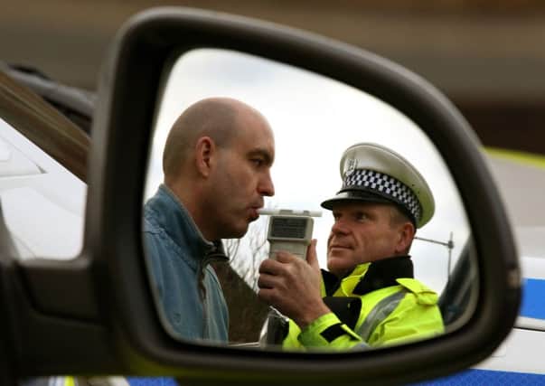 Scotland has the lowest legal limit for alcohol on the roads in the UK. Photograph: Andrew Milligan