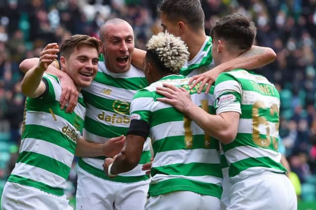 Celtic players celebrate after Forrest scores. Picture: SNS/Craig Foy