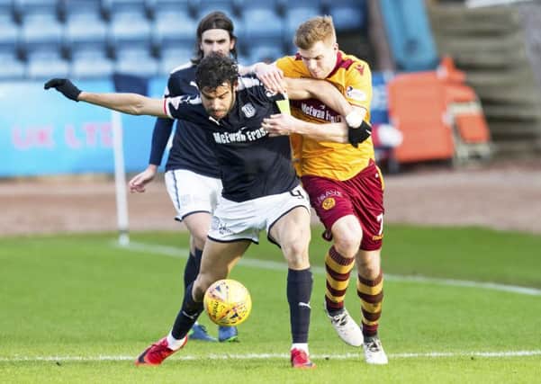 Dundee's Sofien Mousa (left) and Chris Cadden in action. Picture: SNS/Bruce White