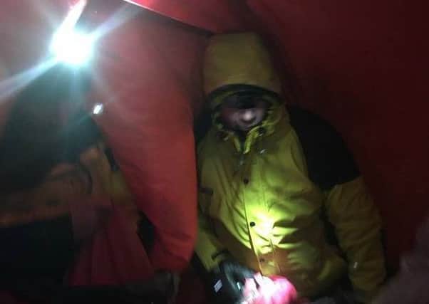 The casualty is assessed by the mountain rescue team. Picture: Cairngorm Mountain Rescue Team/Facebook
