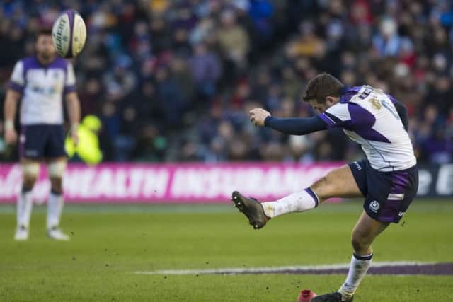 Greig Laidlaw kicks through one of his six successful penalties on the day. Picture: SNS