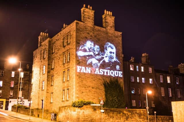 Dewar Place Lane in the city's west end was among the landmarks to be lit up in honour of Scotland's victory