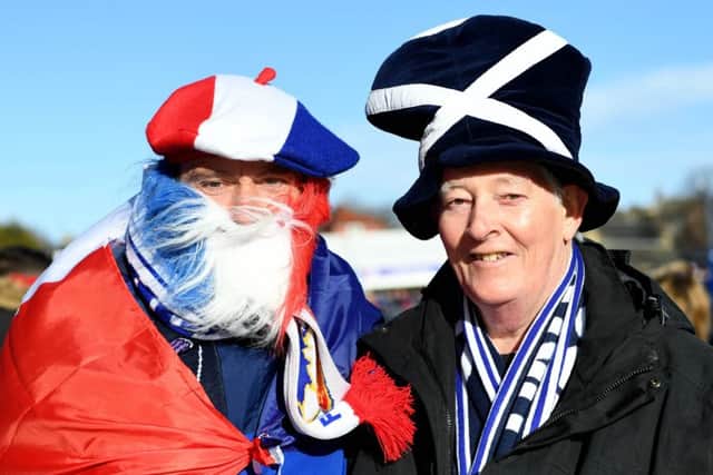 A French fan and Scotland supporter are pictured before the Six Nations match between the two countries on Sunday. Picture: SNS Group