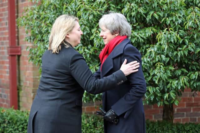 Northern Ireland secretary Karen Bradley welcomes Theresa May to Stormont in Belfast today ahead of talks with all parties. Picture: PA