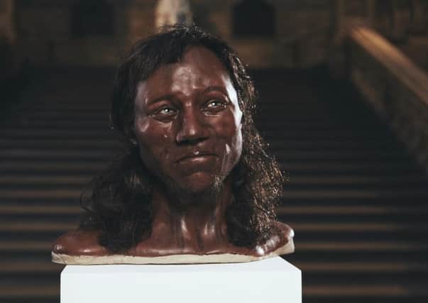 The reconstructed face of 'Cheddar Man' who lived in the UK about 10,000 years ago