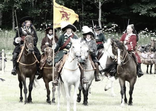 A Battle of Killiecrankie re-enactment group at the Highland site which is due to be further developed by an expansion of the  A9 trunk road. PIC: Flickr/Creative Commons/Iain Cameron.