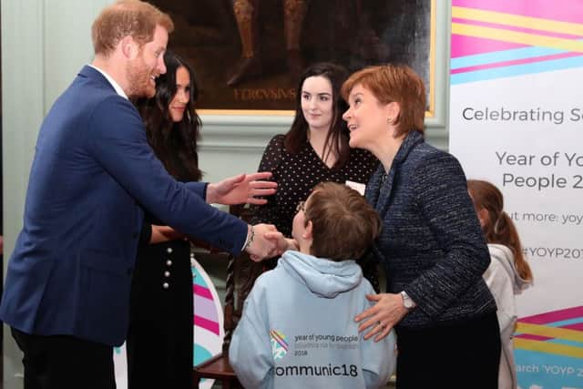 Prince Harry and Meghan Markle meet First Minister Nicola Sturgeon. Picture: Andrew Milligan/PA Wire