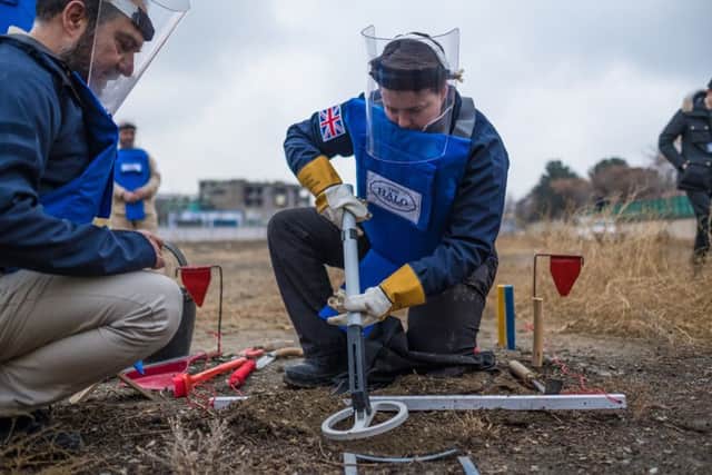 Scottish Conservative leader Ruth Davidson being given training on how to find, excavate and remove landmines by staff of the charity during her visit to Kabul, Afghanistan. Picture: HALO Trust/PA Wire