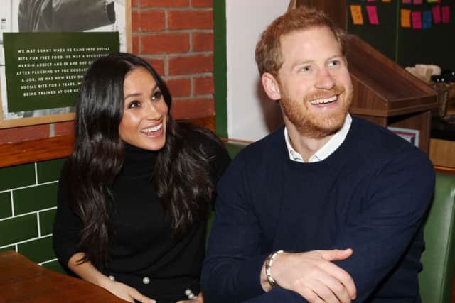 Britain's Prince Harry and his fiancÃ©e US actress Meghan Markle visit Social Bite. Picture; Getty