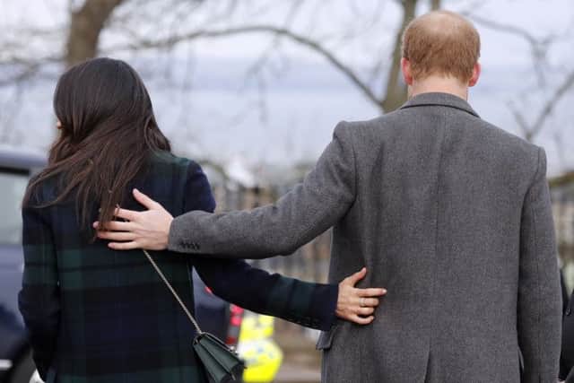 Britain's Prince Harry and his fiancee Meghan Markle arrive at Edinburgh Castle in Edinburgh. Picture; AP