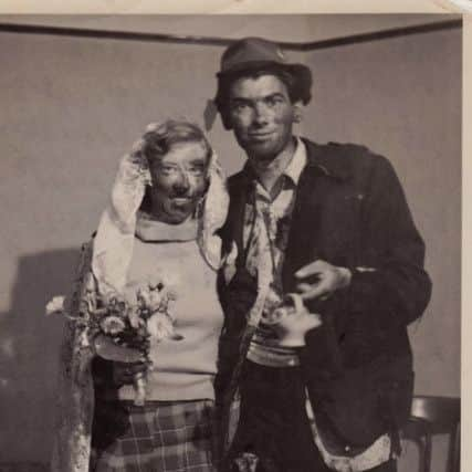 Margaret Montgomery and David Walters at their feet washing in 1956. The practise later became known as  blackening. The couple married in Aberdeen. PIC: Courtesy of family collection.