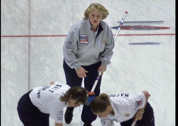 Former Scotland skip Rhona Martin watches as her team sweep to victory against Denmark, in the World Championships in 2000