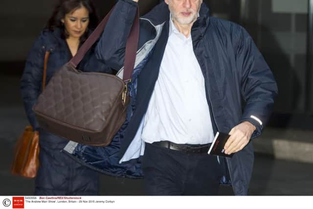 Jeremy Corbyn with a 'manbag'. Picture: Rex