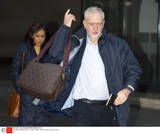 Jeremy Corbyn with a 'manbag'. Picture: Rex