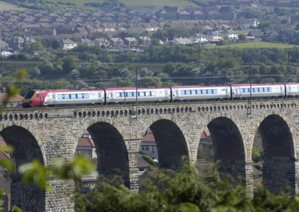 A Virgin (and Stagecoach) train crosses the bridge leading to Berwick Upon Tweed.