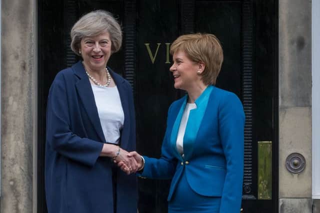 Its all smiles on the steps of Bute House, but the divide between Nicola Sturgeons Scotland and England is widening. Picture: Scott Taylor