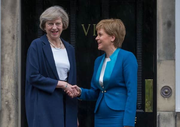Its all smiles on the steps of Bute House, but the divide between Nicola Sturgeons Scotland and England is widening. Picture: Scott Taylor