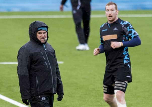 Glasgow Warriors head coach Dave Rennie and Rob Harley train ahead of Friday's Guinness Pro14 match against Toyota Cheetahs. Picture: Craig Williamson/SNS/SRU