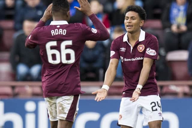 Hearts' Demetri Mitchell celebrates his goal against St Johnstone with Joaquim Adao. Picture: Ross Parker/SNS