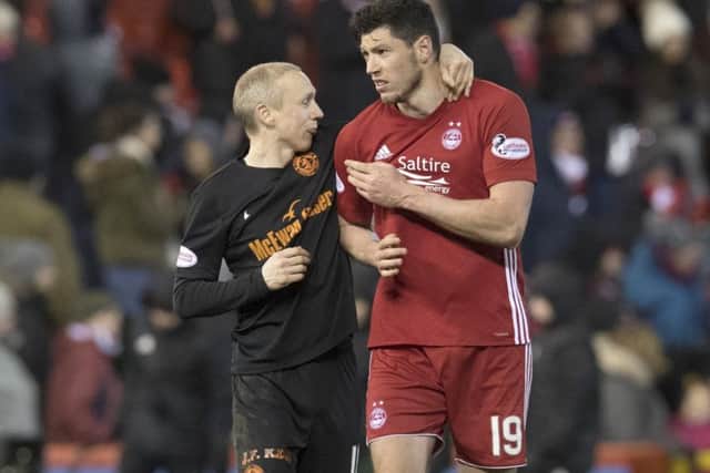 Aberdeen's Scott McKenna, right, with Willo Flood of Dundee United. Picture: Craig Foy/SNS