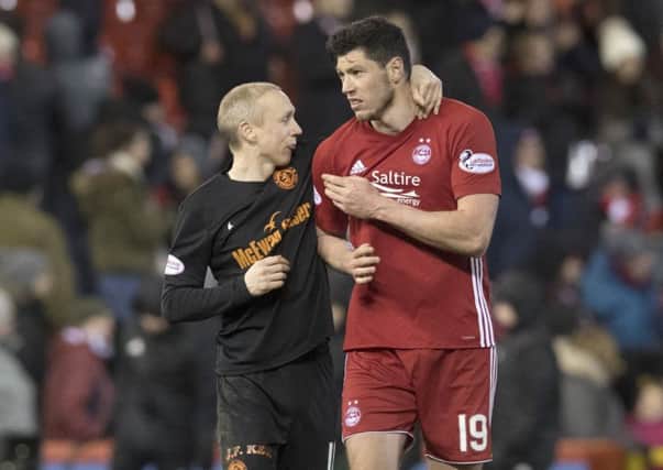 Aberdeen's Scott McKenna, right, with Willo Flood of Dundee United. Picture: Craig Foy/SNS