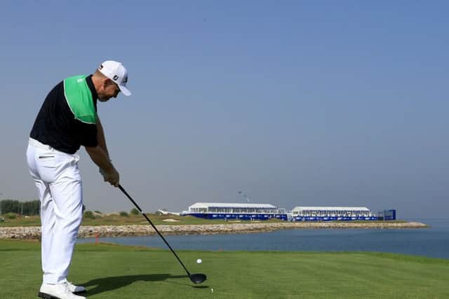 Stephen Gallacher tees off at the 18th hole at Al Mouj Golf in Muscat in the second round of the NBO Oman Open. Picture: Getty Images