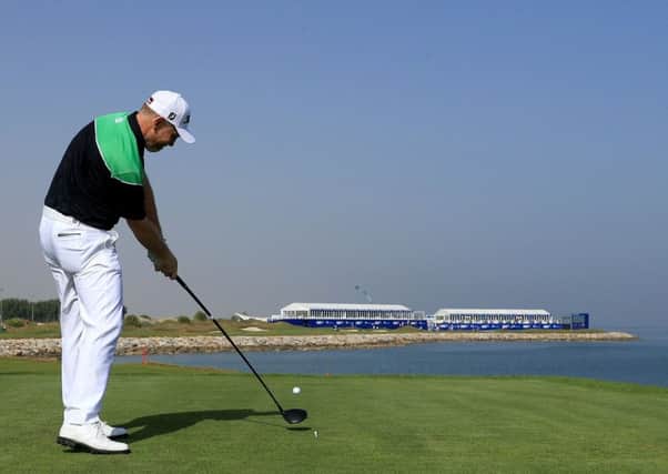 Stephen Gallacher tees off at the 18th hole at Al Mouj Golf in Muscat in the second round of the NBO Oman Open. Picture: Getty Images