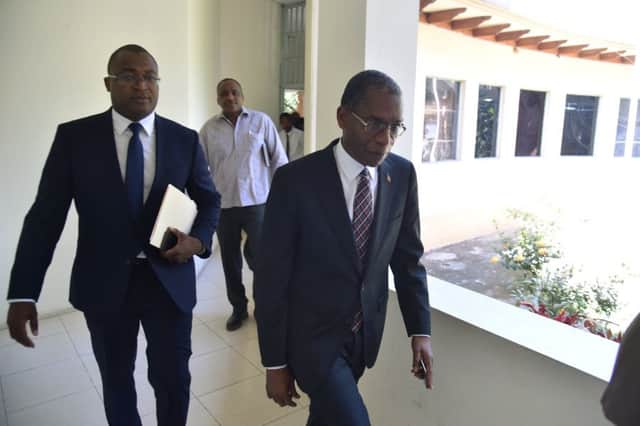 Minister of Foreign Affairs of Haiti, Antonio Rodrigue leaves after a press briefing about the Oxfam case. Picture: AFP/Getty