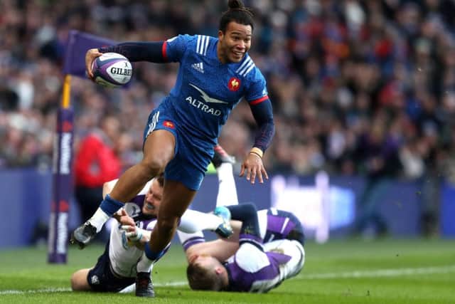 Teddy Thomas breaks through to score France's first try during the Six Nations match between Scotland and France. Picture: Getty Images