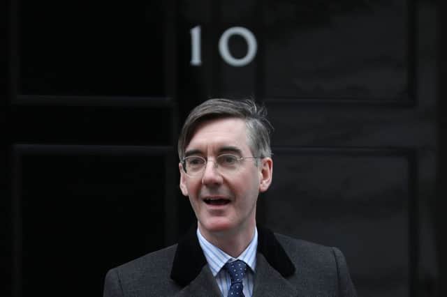 Jacob Rees-Mogg delivers a petition against the provision of foreign aid at 10 Downing Street. Picture: AFP/Getty Images