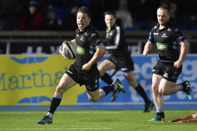 Glasgow Warriors' George Horne breaks through to score his try at Scotstoun. Picture: SNS Group