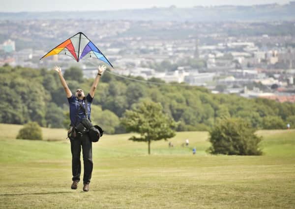 A council in London is to ban activites such as climbing trees or flying kites in public parks. Picture; PA