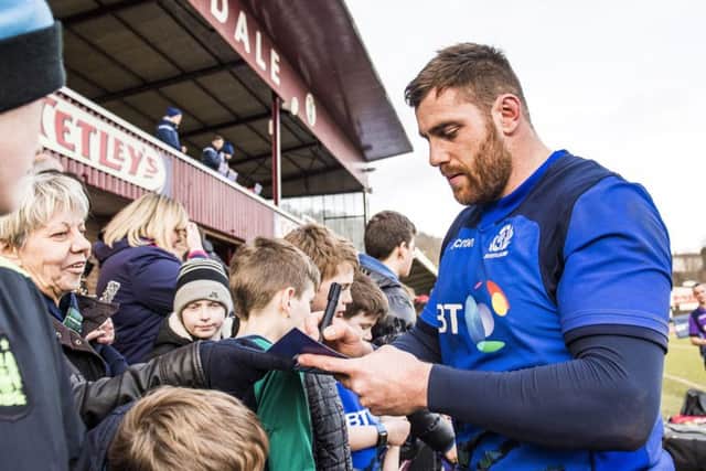 Simon Berghan meets the Scotland fans while training at Galashiels. Picture: SNS