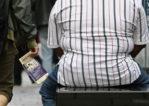 Dr David Blane says the overweight should be given the same priority as smokers and alcoholics with emphasis on psychological and cultural pressures involved. Picture: Jeff J Mitchell/Getty