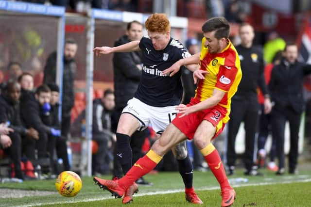 Dundee's Simon Murray (L) in action against Callum Booth. Picture: SNS/Alan Harvey