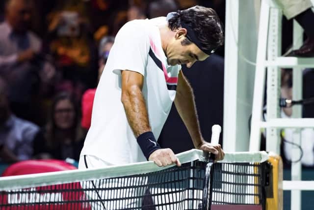 Roger Federer reacts after beating Italy's Andreas Seppi during their semi-final at the ABN AMRO World Tennis Tournament in Rotterdam. Picture: Koen Suyk/AFP/Getty Images