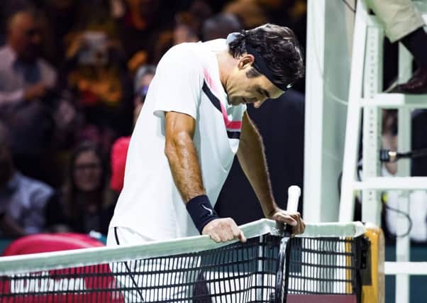 Roger Federer reacts after beating Italy's Andreas Seppi during their semi-final at the ABN AMRO World Tennis Tournament in Rotterdam. Picture: Koen Suyk/AFP/Getty Images