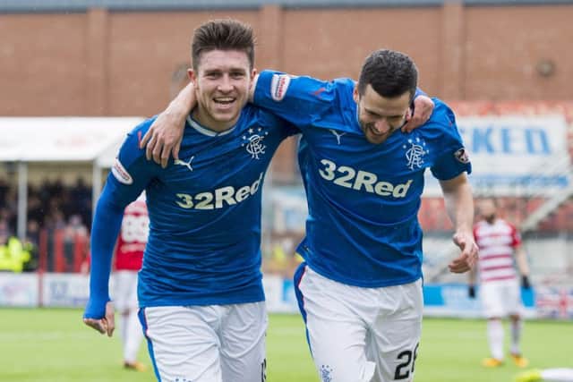 Josh Windass celebrates with team-mate Jamie Murphy. Picture: SNS