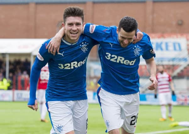 Josh Windass celebrates with team-mate Jamie Murphy. Picture: SNS