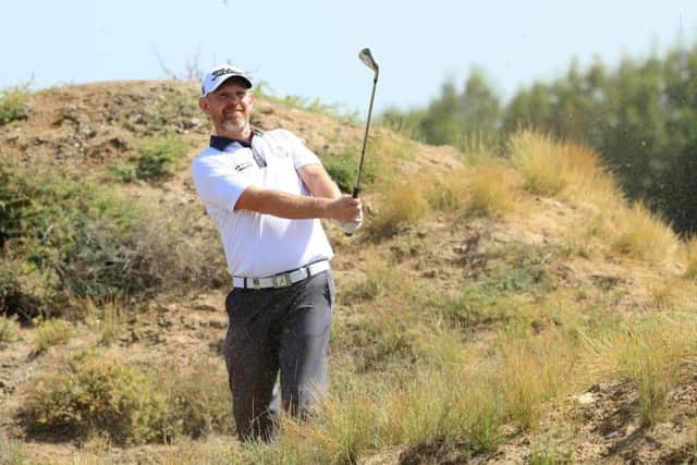 Stephen Gallacher plays his second shot at the first in the final round of the NBO Oman Open at Al Mouj Golf in Muscat. Picture: Getty Images