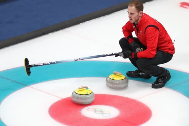 Kyle Smith looks on during the match with Denmark at the Gangneung Curling Centre. Picture: PA