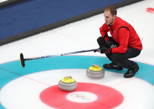 Kyle Smith looks on during the match with Denmark at the Gangneung Curling Centre. Picture: PA