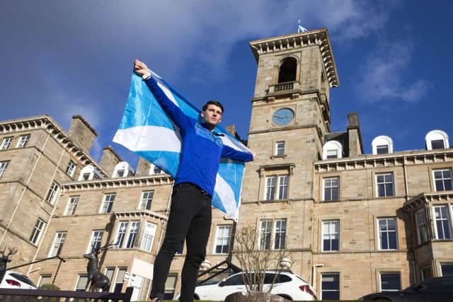 800m runner Guy Learmonth flies the flag ahead of the Commonwealth Games. Picture: Jeff Holmes