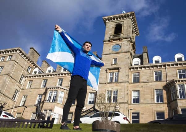 800m runner Guy Learmonth flies the flag ahead of the Commonwealth Games. Picture: Jeff Holmes
