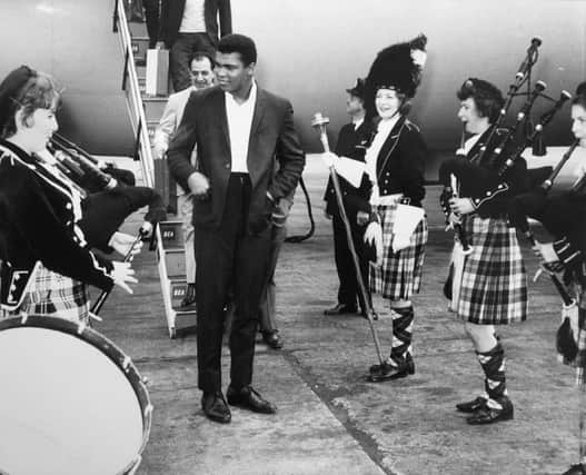 Picture of Muhammad Ali (Cassius Clay) arriving in Scotland at Glasgow Airport before his exhibition matches held at Paisley Ice Rink in 1965