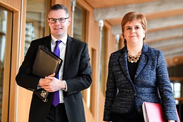Finance secretary Derek Mackay and First Minister of Scotland Nicola Sturgeon arrive at the Scottish Parliament for the final vote on the Scottish Budget. Picture: Jeff J Mitchell/Getty Images