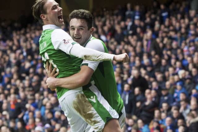 Scott Allan, left, celebrates with John McGinn after the latter opens the scoring at Ibrox. Picture: SNS