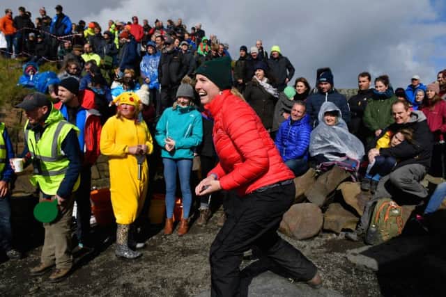 Competitors compete in the World Stone Skimming Championships, held on Easdale Island. (Jeff J Mitchell/Getty Images)